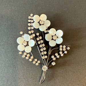 Elegant Floral Brooch with White and Silver Accents